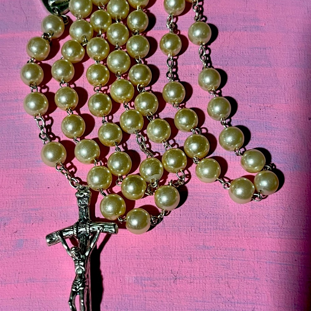 A lovely faux pearl rosary.